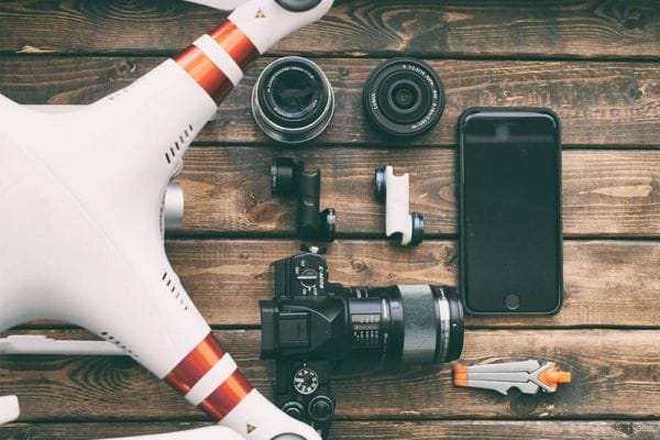 A guide on purchasing a drone for photography, showing various drone models and accessories for aerial photography.